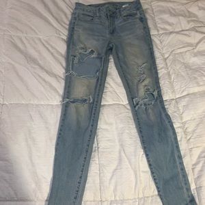 high rise jegging ripped jeans